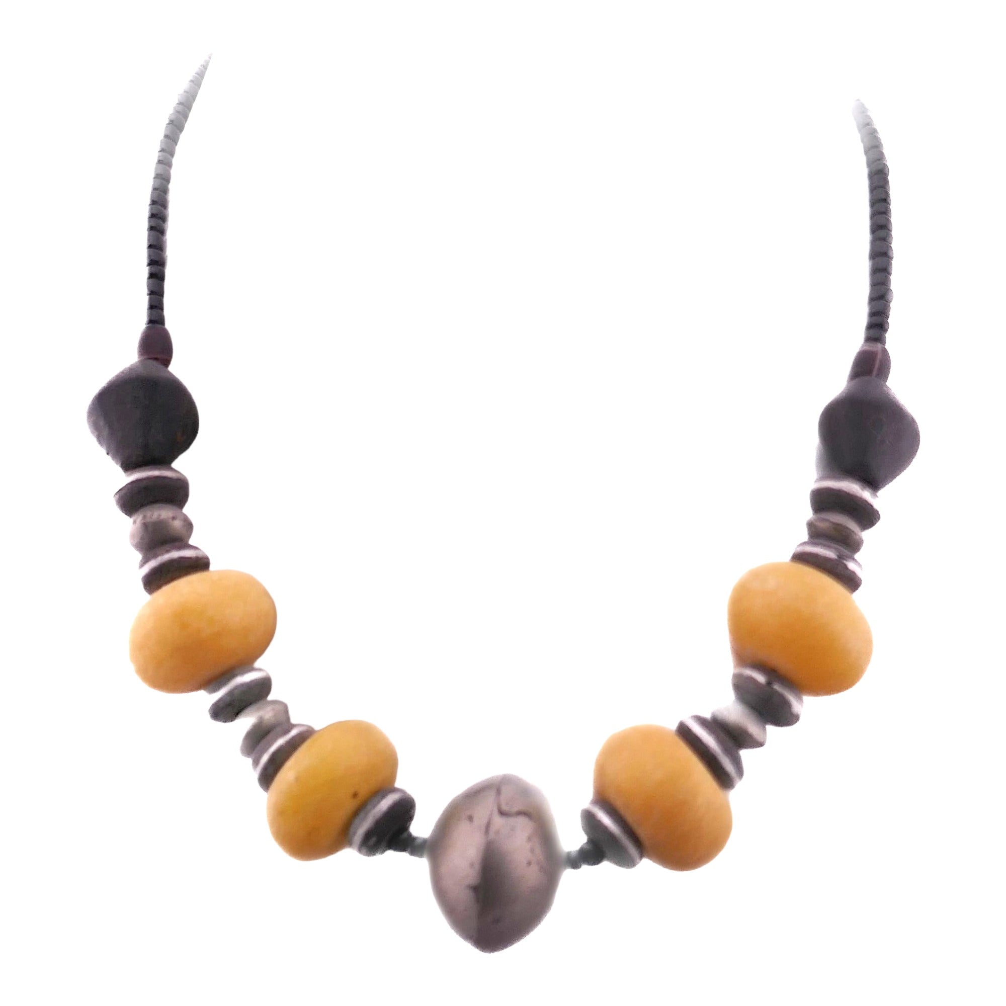 African beaded Necklace // 17" / 44 cm // Pale amber beads with metal pendant // Hand made in Senegal, West Africa // orange Presentation Pouch - FriendlyTradingCo