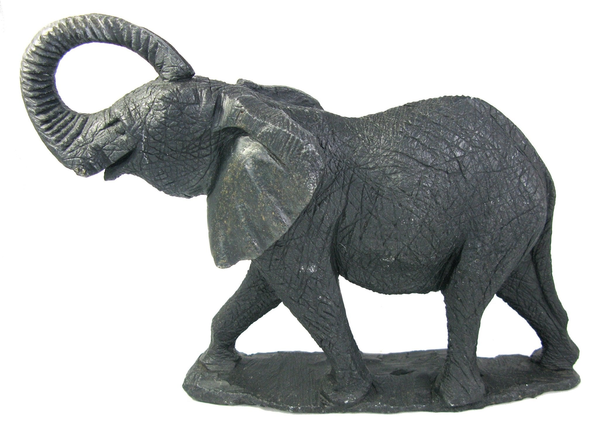 Hand-carved African elephant sculpture in serpentine stone, 20cm, by Shona artisans of Zimbabwe